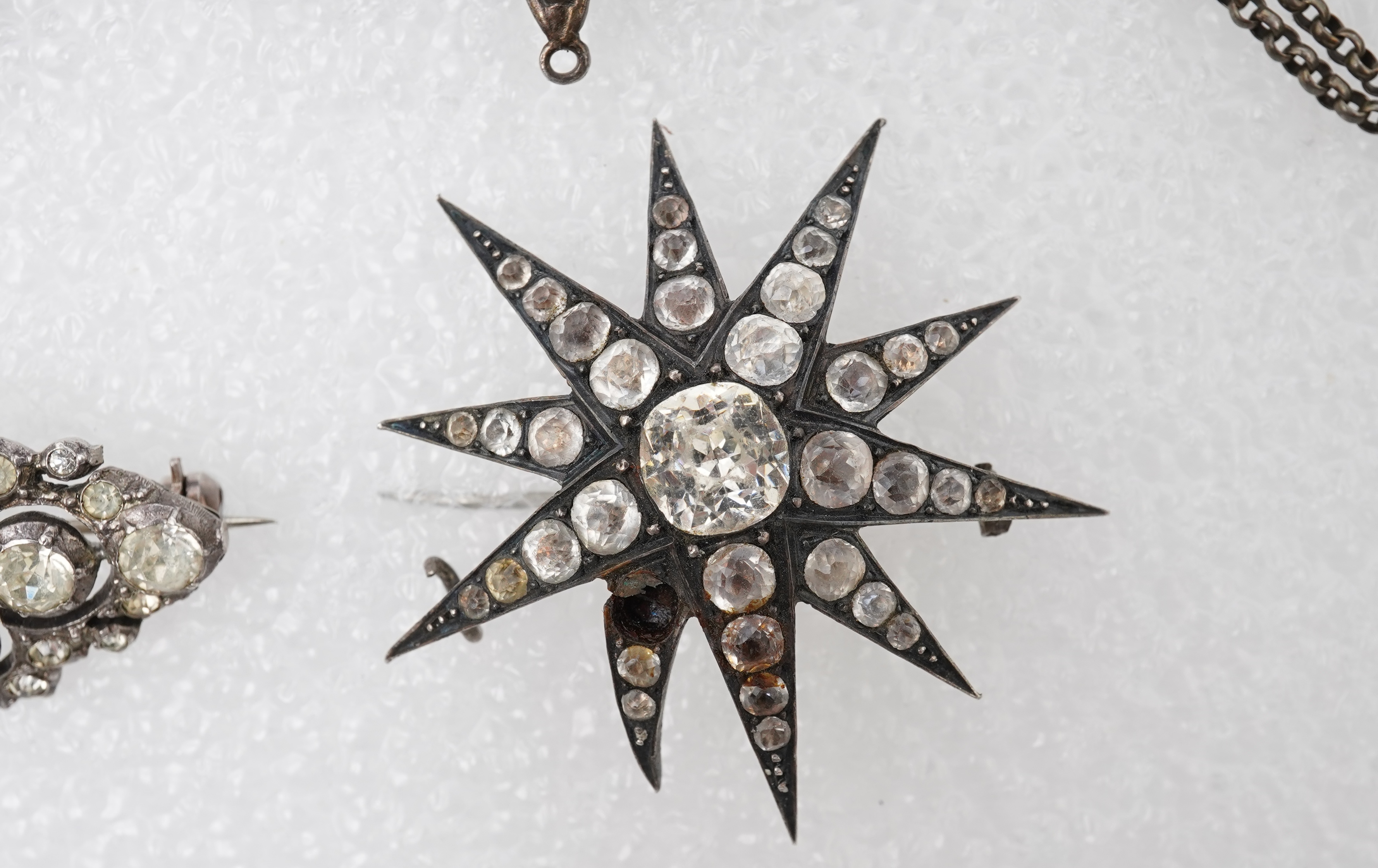 A group of jewels, comprising: a late 19th century and later Renaissance revival-style pendant set with an oval turquoise cabochon, circular-cut garnets and circular-cut green chalcedony, mounted in silver, length 6cm, s